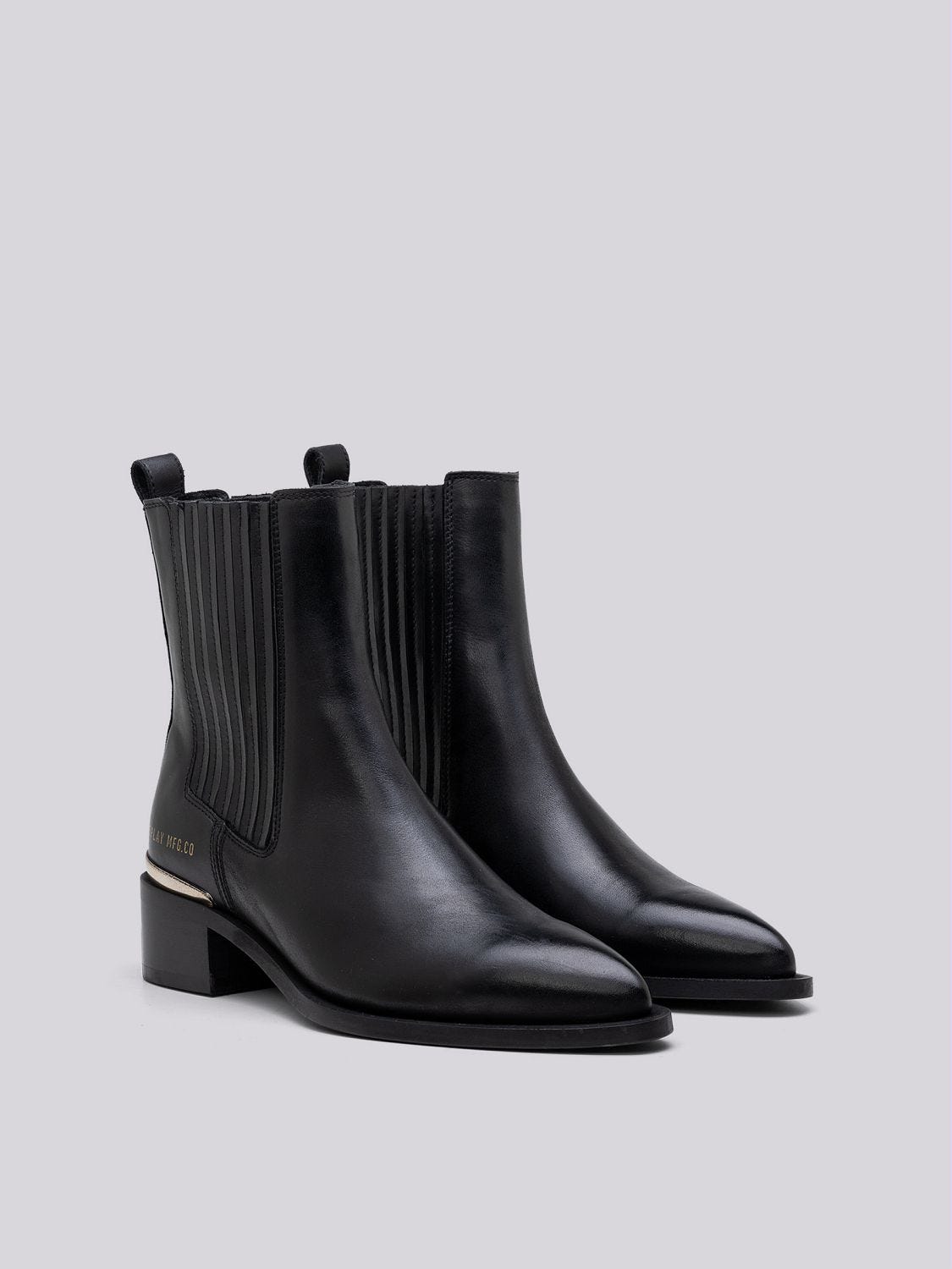Black boots with gold detail hotsell