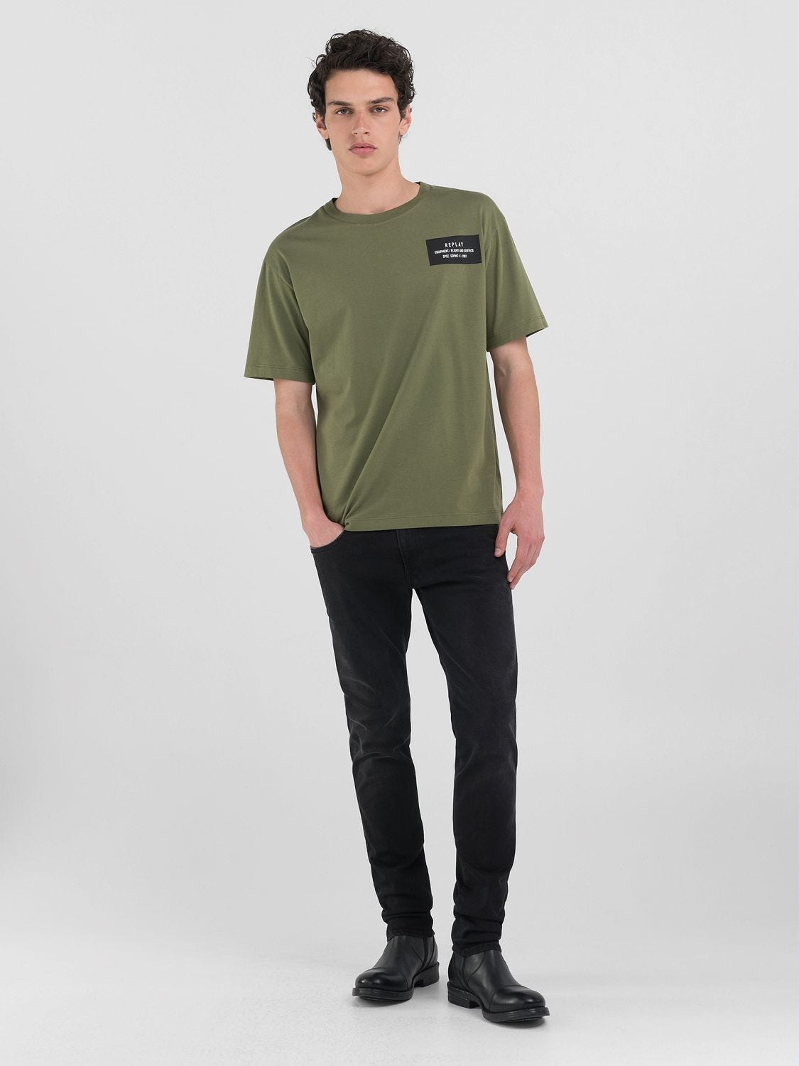 Green t shirt black jeans outlet