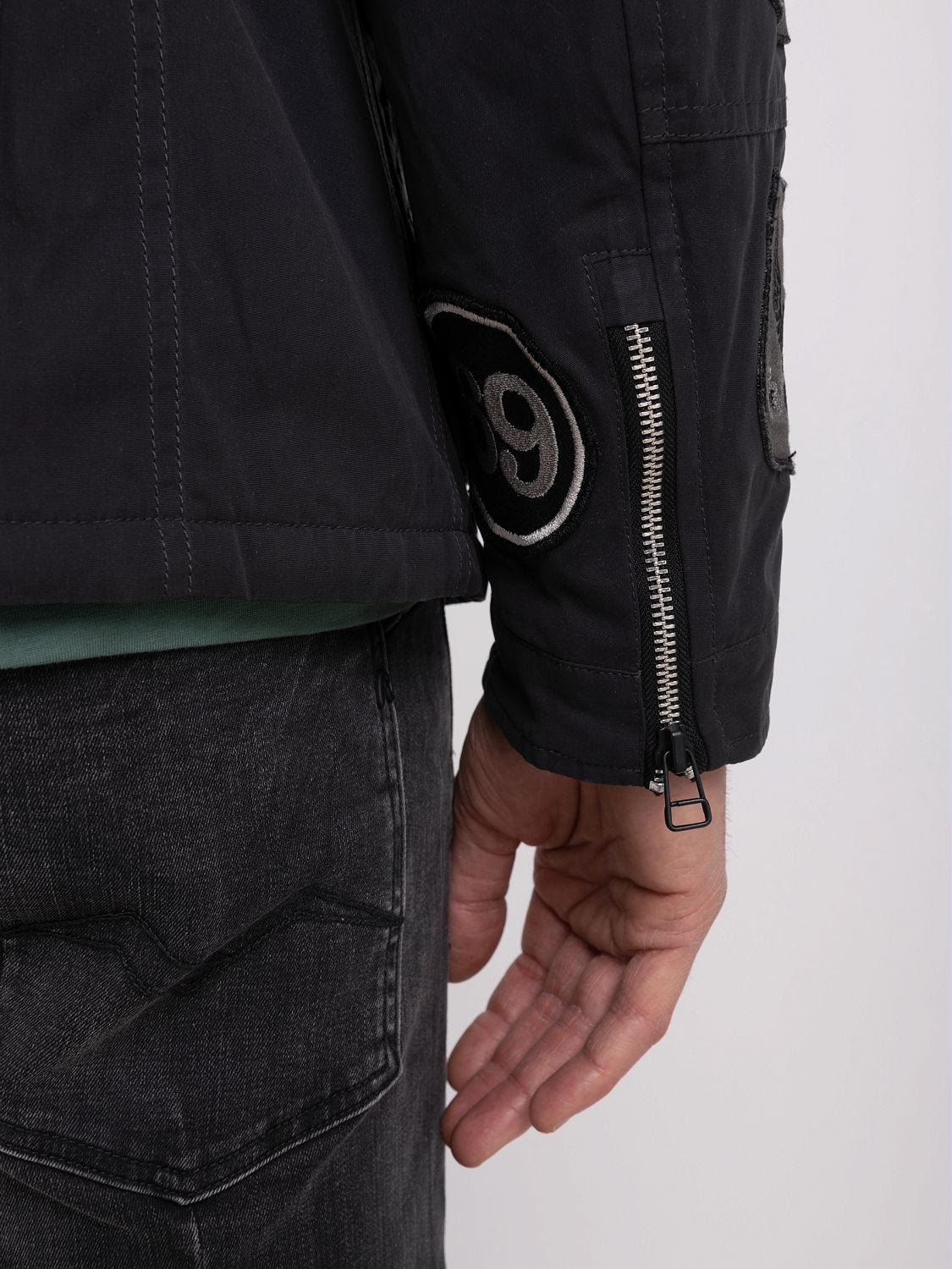 Biker jacket in waxed nylon with riders patch