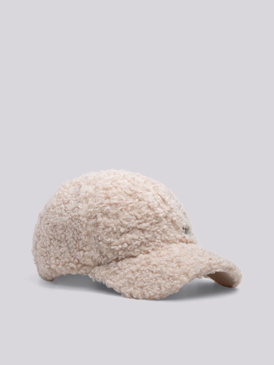 KAPPE MIT SCHIRM AUS TEDDY-ÖKO-FELL