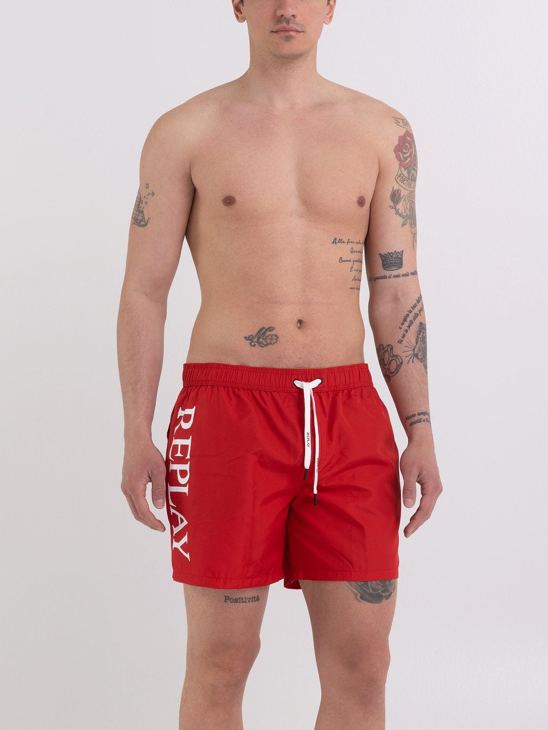 Swimming trunks with pockets and print