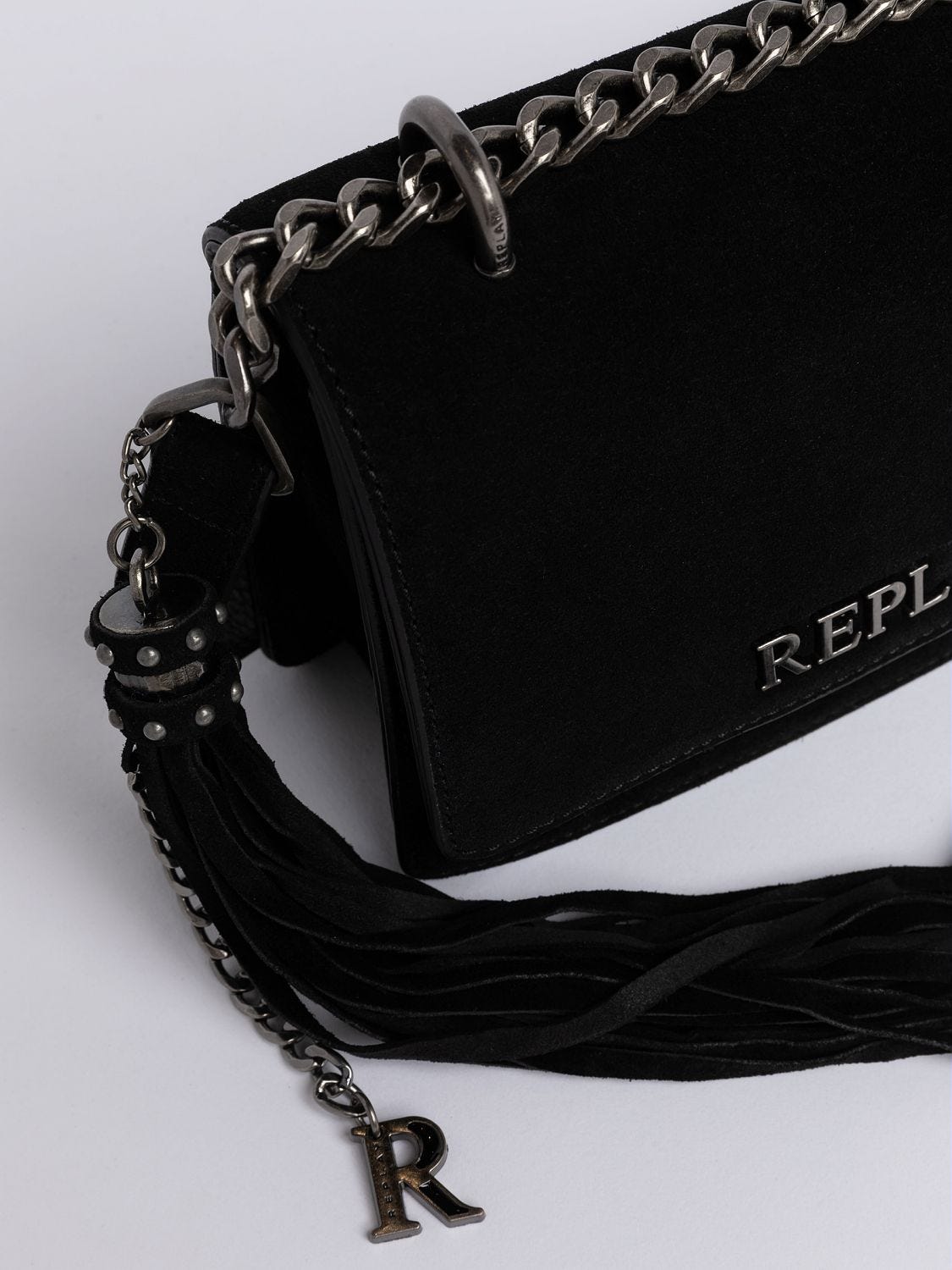 Crossbody bag in solid coloured suede