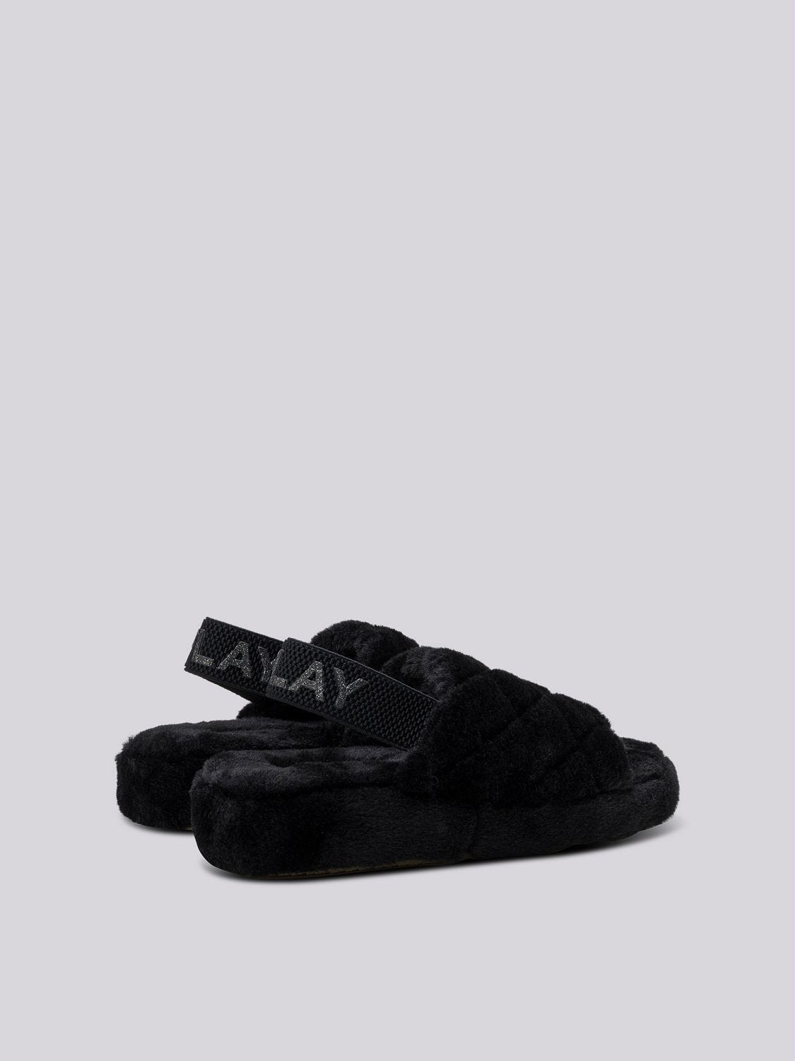 Puma furry slides 7 little words hot sale