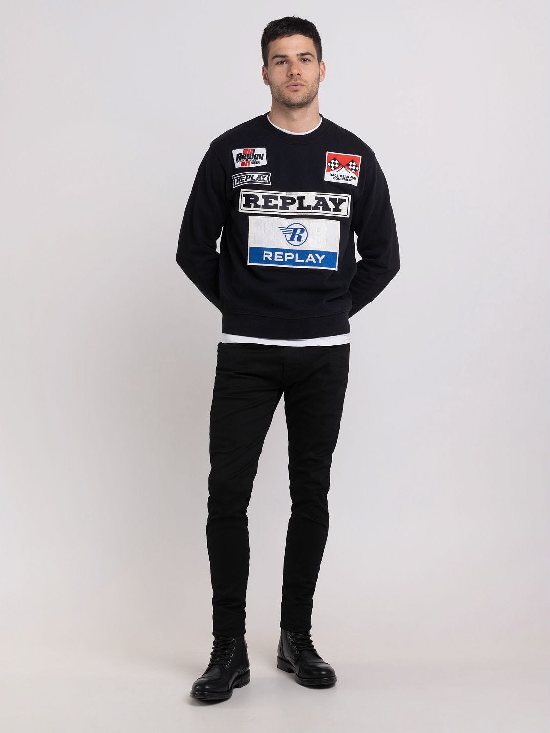 Crewneck sweater with racer patch