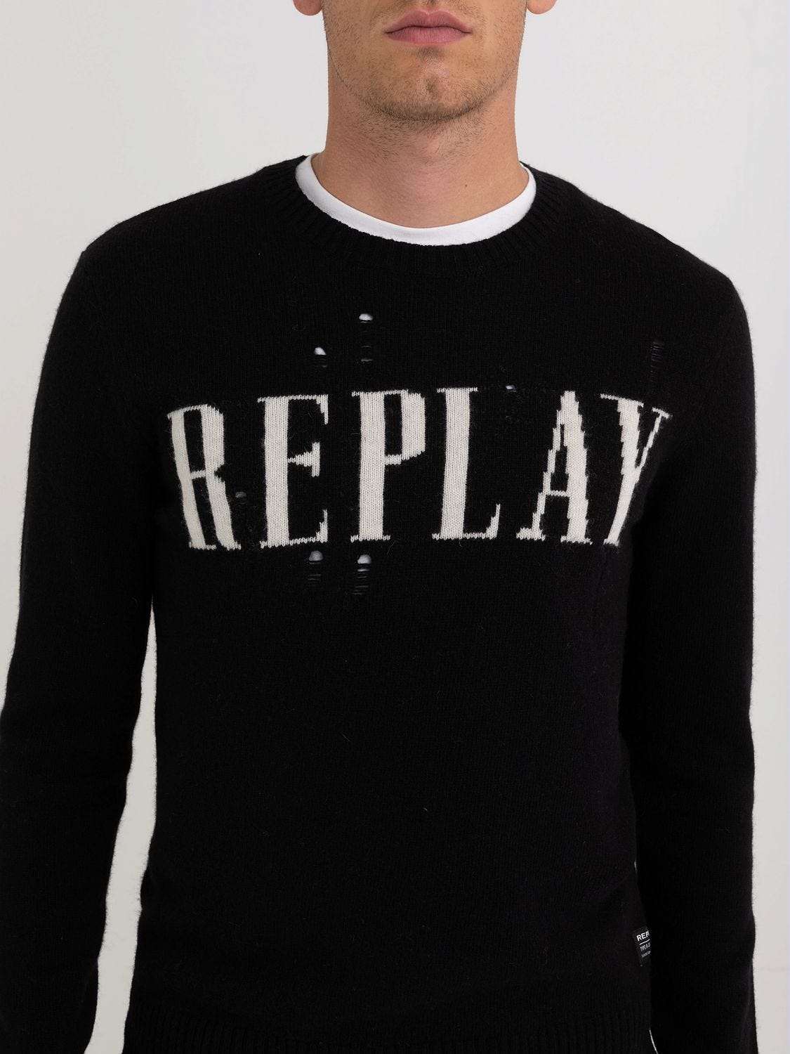 Sweater with jacquard logo