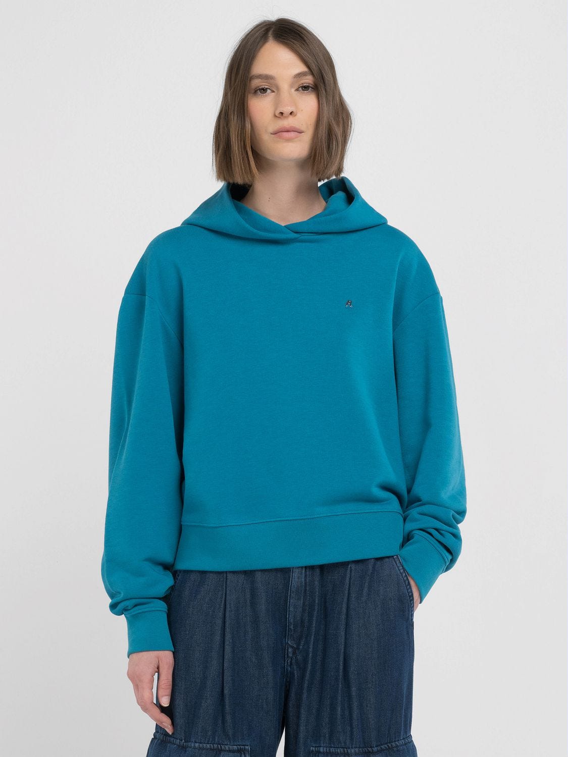 FELPA OVERSIZE CON CAPPUCCIO