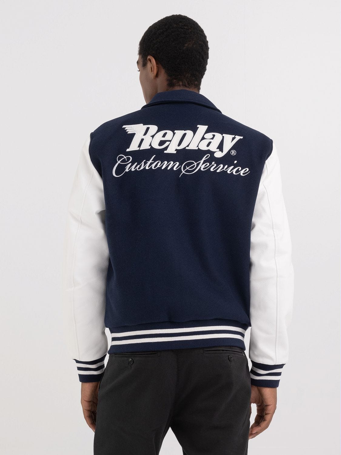 Varsity jacket with zipper and appliques